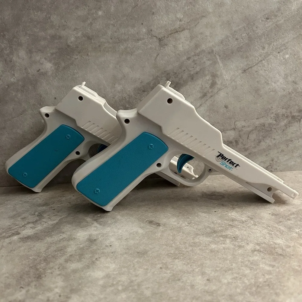 Nyko Perfect Shot Gun Controller White Blue Orange for Nintendo Wii Remote Pair